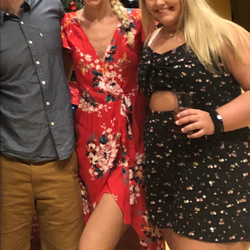 Black floral romper with cutout and tie front